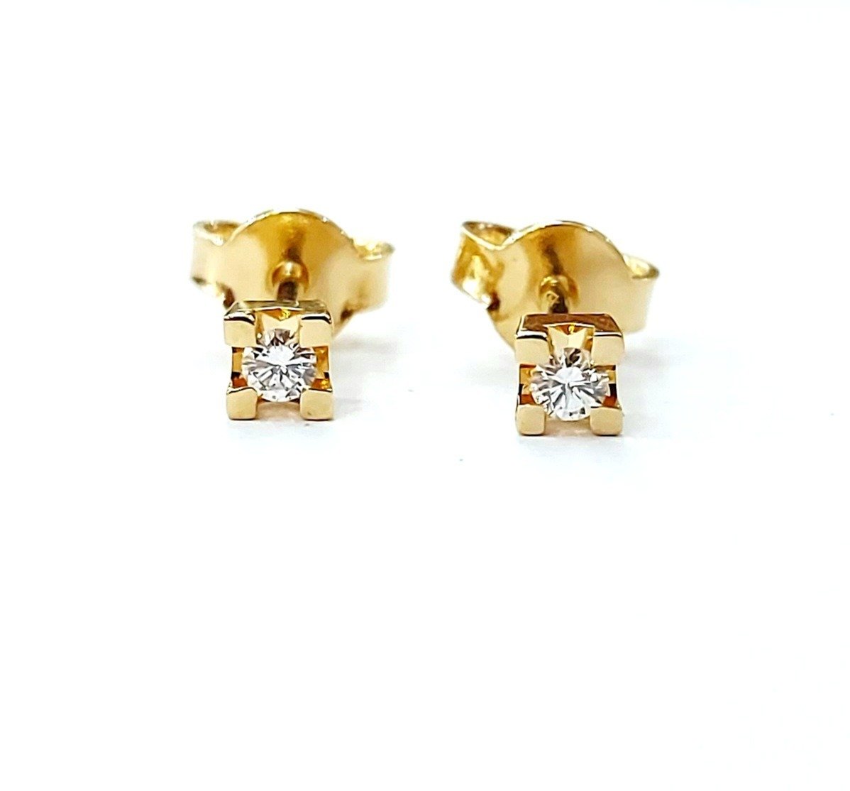 Orecchini punto luce a tornito con Diamanti 0,20 ct in Oro Giallo 18 kt (750)