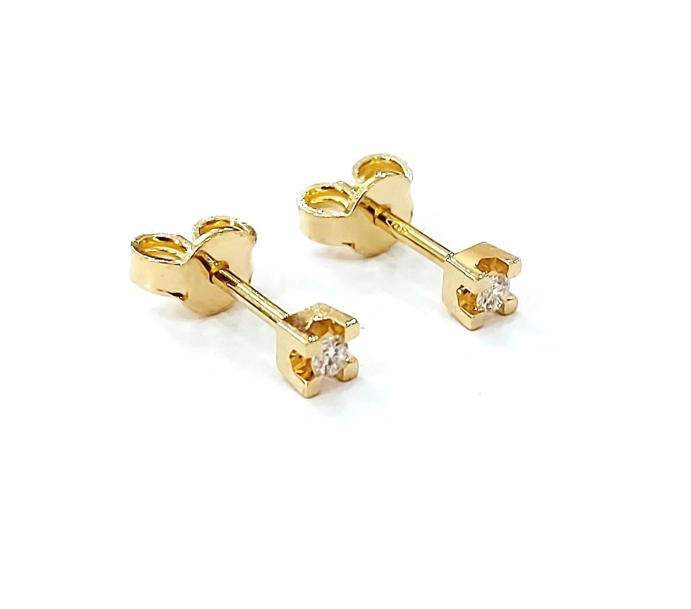 Orecchini punto luce a tornito con Diamanti 0,20 ct in Oro Giallo 18 kt (750)