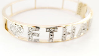 Bracciale rigido Astralia in Oro Bianco e Oro Giallo con lettere e simboli con Diamanti 1,09 ct 18 kt (750)