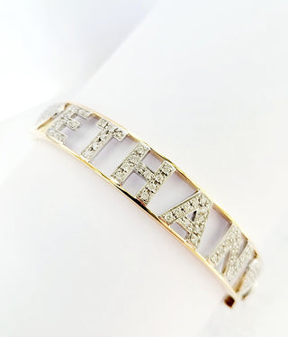 Bracciale rigido Astralia in Oro Bianco e Oro Giallo con lettere e simboli con Diamanti 1,09 ct 18 kt (750)