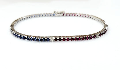 Bracciale tennis modello "Pepsi" in Oro Bianco con Diamanti 0,15 ct, Rubini 1,95 ct e Zaffiri 1,70 ct 18 kt (750)