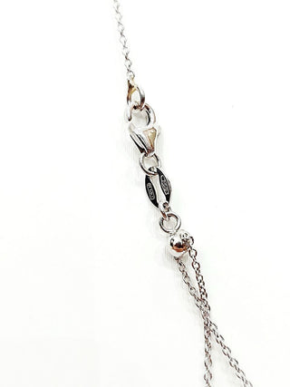 Collana  pendente modello  Magic fiore Diamanti 0,21 ct Smeraldo 0,35 ct in Oro Bianco 18kt -750