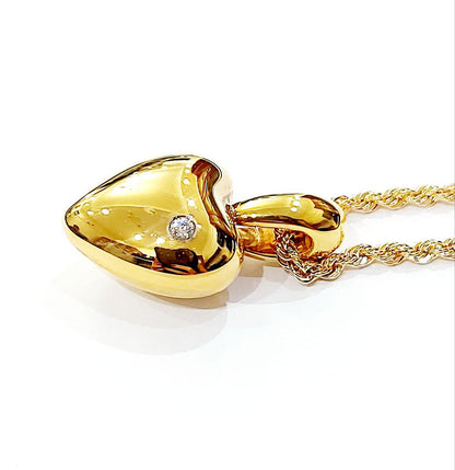 Collana  pendente cuore bombato lucido  in Oro Giallo 18 kt -750 con Diamante taglio brillante ct 0,06