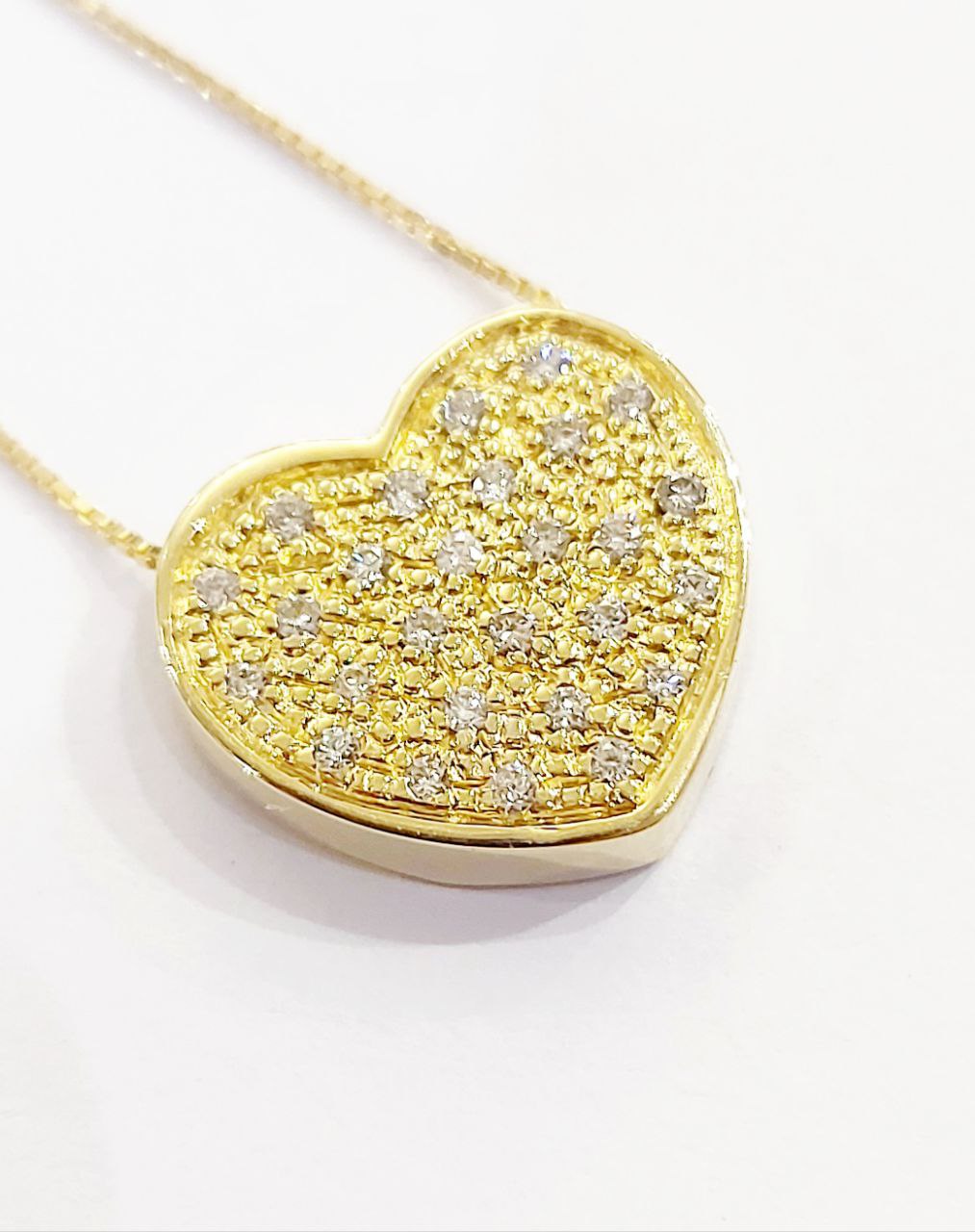 Collana e pendente a forma di cuore Oro Giallo con Diamanti ct 0,30 18 kt (750)