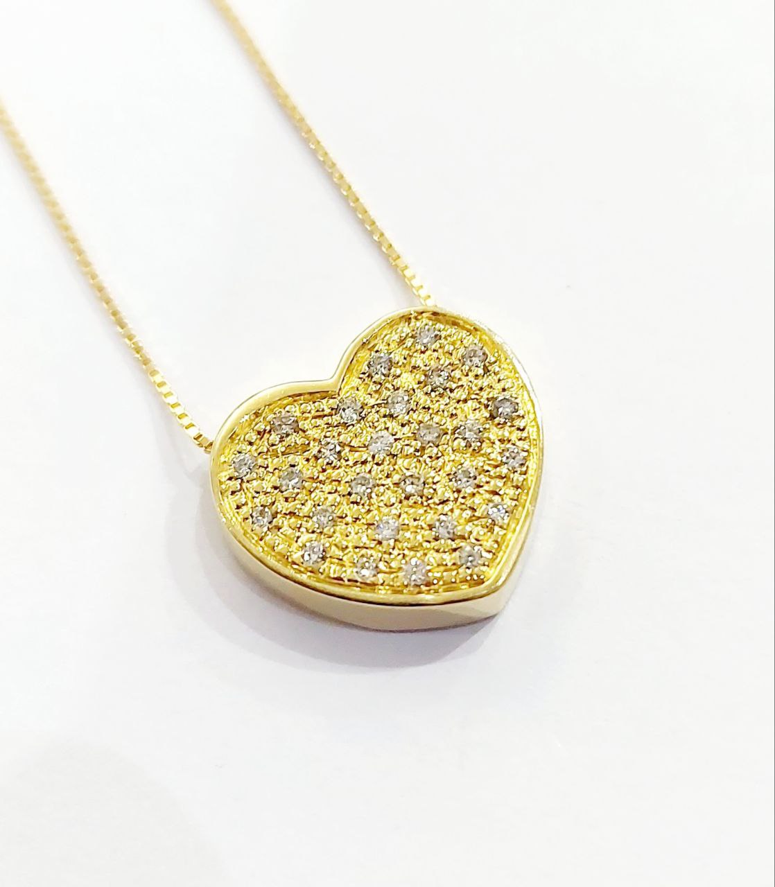 Collana e pendente a forma di cuore Oro Giallo con Diamanti ct 0,30 18 kt (750)