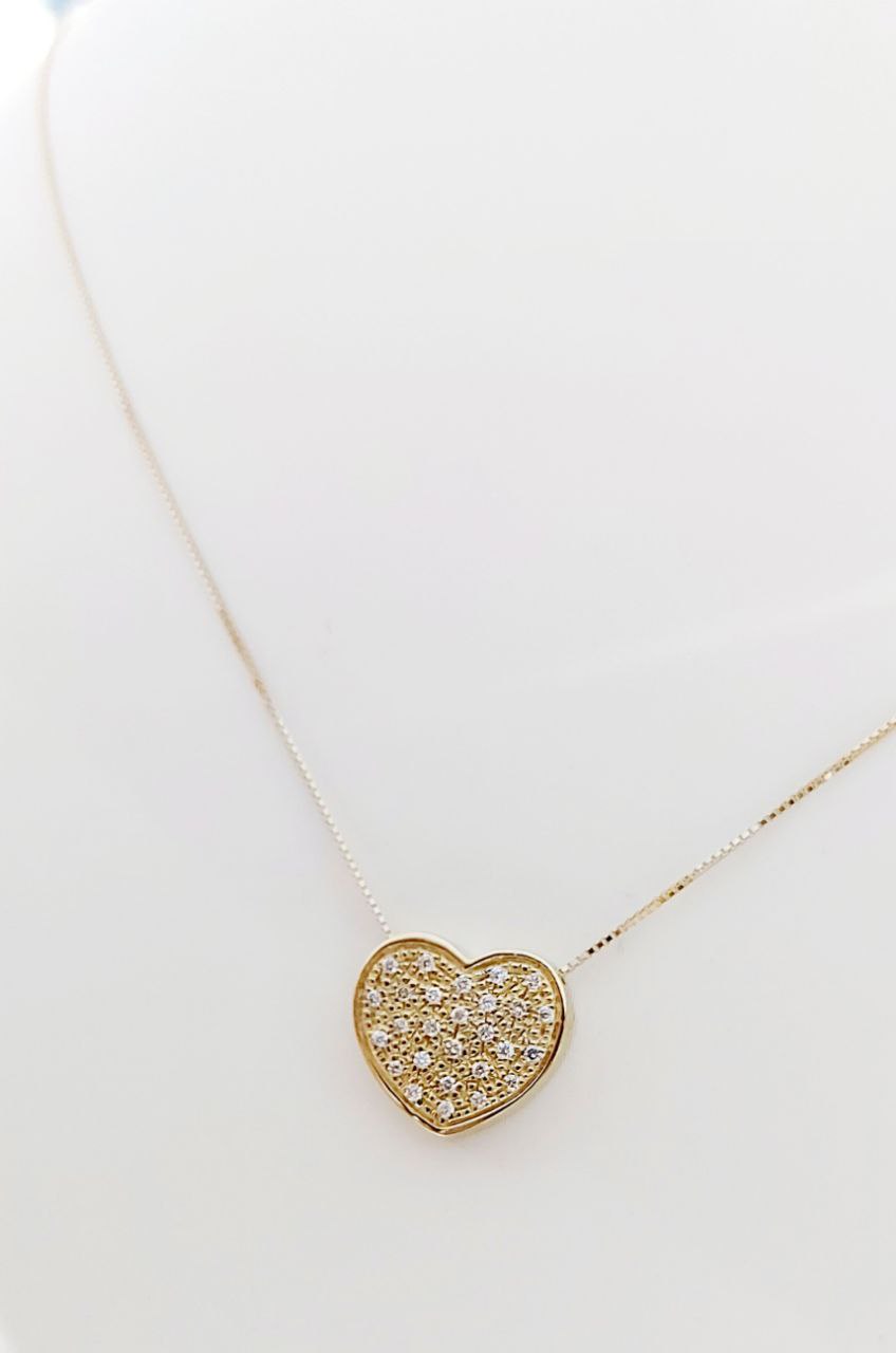 Collana e pendente a forma di cuore Oro Giallo con Diamanti ct 0,30 18 kt (750)